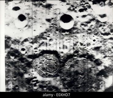 Oct. 14, 1966 - 14.10.66 Hidden side of the moon. A high resolution photograph made by the National Aeronautics and Space Administration's Lunar Orbiter I spacecraft an August 24th, 1966 of an area on the hidden side of the moon has disclosed an unusual fractured crater floor which may be a source of volcanic materials. The fractures appear as an irregular pattern like that observed in a dried mud flat. North is roughly at the top of the photograph when it is viewed with the two large flat craters at the top Stock Photo