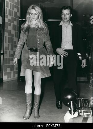 Apr. 04, 1967 - French actress Brigitte Bardot is here in Rome to take part in a film based on an E.A. Poe novel with Alain Delon. Photo shows Brigitte Bardot and Alain Delon going to a dinner in a private home of their friend. Stock Photo