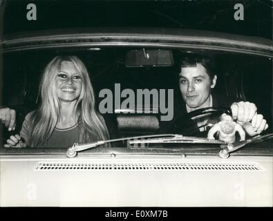 Apr. 04, 1967 - French actress Brigitte Bardot is here in Rome to take part in a film based on an E.A. Poe novel with Alain Delon. Photo shows Brigitte Bardot and Alain Delon going to a dinner a private home of their friend. Stock Photo