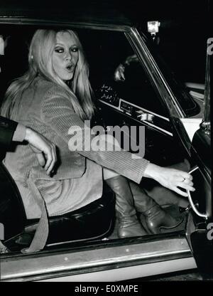 Apr. 04, 1967 - Rome: French Actress Brigitte Bardot is here in Rome to take part in a film based on an E.A. Poe novel with Alain Delon. Photo Shows Brigitte Bardot and Alain Delon going to a dinner in a private home of their friend. Stock Photo