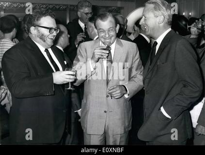 Jun. 06, 1967 - Mr Edward Heath at Variety Club Ladies' Lunch: The Rt. Hon. Edward Heath, M.P., leader of the opposition, was guest of Honour at the variety club of Great Britain's Ladies' Luncheon, at the Dorchester Hotel, Park Lane, London, today. The annual lunch is the only one of the year to which Variety members may invite ladies, all of whom receive a gift of beauty requisites. Photo shows (L. to R.), Comedian Harry Secombe, H.E. Aharon Remez, the Israeli Ambassador, and Edward Heath M.P., Leader of the opposition, share a joke together at the luncheon today. Stock Photo