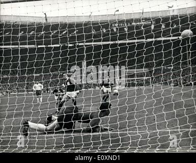 Apr. 22, 1967 - Dramatic Save. Wembley, England: Enfield goal-keeper I. Wolstenholme makes a dramatic extra-time save to keep his side's hopes of cup success alive. A penalty was awarded to Skelmersdale United parried by the Enfield 'keeper. The two teams played a scoreless draw in his Football Association Amateur Cup Final before a 75,000 crowd. The replay will be staged next Saturday, at Manchester. Stock Photo