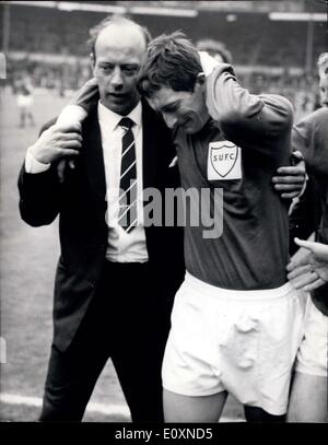 Apr. 22, 1967 - CUP TEARS. WEMBLEY, ENGLAND : A near to tears A. BERMINGHAM, the Skelmersdale right-back who missed a penalty during extra-time of the F.A. Amateur Cup Final at Wembley Stadium, London this afternoon - 22nd April is consoled by his team-manger at the end of the game. The two teams played a scoreless draw after extra time before a 75,000 crowd. The replay will be staged next Saturday at Manchester. Stock Photo