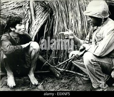 May 05, 1967 - War in Vietnam Viet Cong Tax collector caught: During an American Marine raid on a village in South vietnam they Stock Photo