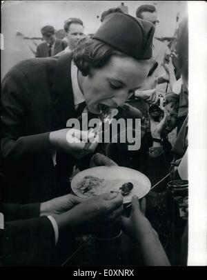 Jul. 07, 1967 - Princess Benedikte visits guide camp: Princess Benedikte of Denmark made a visit to the guide camp near Ringsted in Denmark, were 15,000 girl guides from 21 nations. Photo shows Princess Benedikte is seen tasting a pancake made by one of the guides during her tour of the camp. Stock Photo