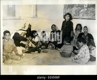 Jun. 21, 1967 - 21-6-67 Thousands of refugees flee into Jordan from the West Bank of Palestine. A serious refugee problem is developing in the Middle East, one of the aftermaths of the six-day Arab-Israeli war. The Jordanian and Israeli Governments have urged Arabs on the Israeli-occupied West Bank of Palestine to stay where they are, but already more than 100,000 have crossed into Jordan. Photo Shows: Some of the refugee children who have arrived in Amman are seen here being cared for in a local school. Stock Photo