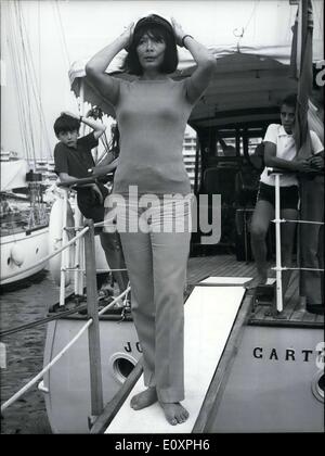 Jul. 28, 1967 - Letting her husband Michel Piccoli be for a little while, Juliette Greco went to spend a short vacation in Cannes to relax and breathe some fresh air. Picture: Hat on her head, Mrs. Juliette Piccoli, plays captain. Stock Photo