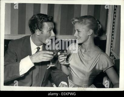 Aug. 08, 1967 - ''Look back in Anger'' Playwright weds actress; The wedding took place yesterday morning at Chelsea Register Office - specially opened for the ceremony of playwright John Osborne who wrote the play ''Look back in Anger'' - and star of the show - Mary Ure. The couple flew to the Riviera for a short honeymoon. Photo Shows John Osborne and his bride toast each other at the reception after their wedding yesterday. Stock Photo