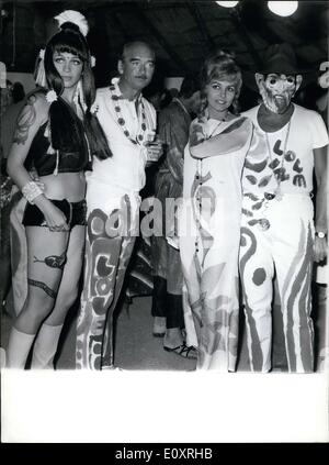Aug. 14, 1967 - Until today, France was spared from psychedelic fashion-- by that we mean, a crazy fad started across the Atlantic. Thanks to Eddie Barclay, CEO of a big disco company, psychedelic fashion just appeared in St. Tropez, which truly doesn't suit it at all. (From left to right) Marie-Christine Barclay, wife of Eddie Barclay; Eddie Barclay; Michele Mercier and guest. Stock Photo