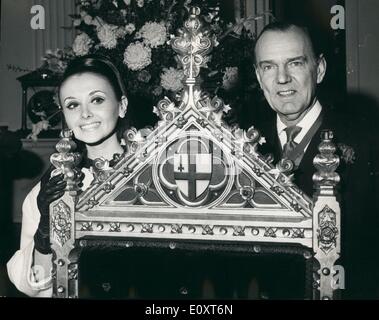 Nov. 11, 1967 - Miss World at the Mansion House: Miss Peru - 21-year ol Madeleine Hartog Bel who was crowned Miss World at the Lyceum, London, last night, this morning went to the Mansion House to Visit the Lord Mayor of London. Photo shows The Lord Mayor of London, Sir Gilbert Inglefield, shows Miss World the Lord Mayor's receiving throne - at the Mansion House today. Stock Photo