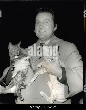 Dec. 16, 1967 - The National Cat Club Show At Olympia: Photo Shows Actor Patrick Macnee,. of the well known TV series ''The Avengers'', pictured his two cats. ''Mickleton Sailor'' (left) and ''Mickleton Cornish Wafer'', which ahs entered at the show today. Stock Photo