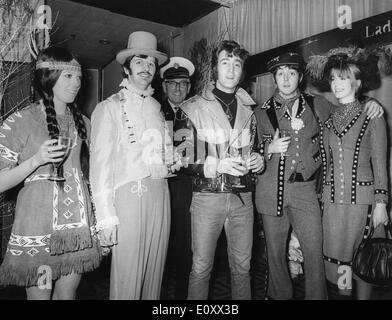 The Beatles wearing costumes at a party they threw Stock Photo Alamy