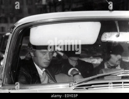 Apr 12, 1968 - Versailes, France - JOHNNY HALLYDAY with a deeply worried look as he arrives at the Versailies Hospital after his wife Sylvie Vartan was in a car accident that has left her badly injured in a road accident. The driver of the car was Mercedes Calmel who was killed. Stock Photo