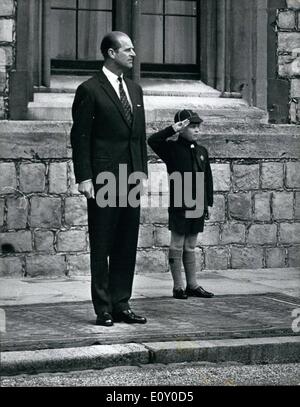 Apr. 29, 1968 - April 29th, 1968 Prince Andrew takes salute. Eight-year old Prince Andrew, wearing his Cub Scout uniform, stands with his father, Prince Philip as they take the salute at the march past of the Queen's Scouts during their St. George's Day Parade in the quadrangle at Windsor Castle, yesterday. Stock Photo
