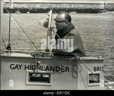 May 05, 1968 - He Hopes To Make Single-Handed Crossing of Atlantic In Submarine-Shaped Steel Cylinder. 52-year-old Douglas Price, of Temple Cloud, Somerset, with his home-made submarine-shaped cylinder, Gay Highlander, 26ft. long, during trials at Torbay, Devon. The boat, which has passed the Board of Trade inspection, is powered by a converted lorry engine, and is registered at 1.32 tons. Mr. Price hopes to make an Atlantic single-handed crossing by the southern route in June in 40 days. Stock Photo