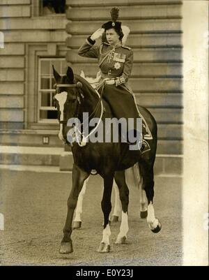 Jun. 06, 1968 - Trooping The Colour Ceremony: The ceremony of the Trooping the Colour took place this morning on Horse Guards Parade to celebrate the official Birthday of the Queen. The colour that was trooped was that of the 2nd Battalion Coldstream Guards. Photo Shows: The Queen salute's as she leave Buckingham Palace this morning for the Trooping ceremony on Horse Guards Parade. Stock Photo