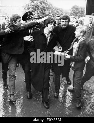 Singer Paul McCartney surrounded by fans Stock Photo