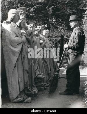 Oct. 10, 1968 - Statues from House of Parliament to be sold. Photo shows Mr. John Lyons, a gardener at the Palace of Westminster, looking at some of the stone statuettes which are to be sold by tender by the Ministry of Public building and works. The statuettes, mostly unidentified Saxon kings and queens, have been removed during rebuilding and renovation from the exterior of the Houses of Parliament. Stock Photo