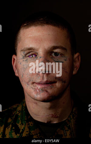 US Marine LCpl Kyle Carpenter portrait during the first corporals course for wounded warriors at the Walter Reed National Military Medical Center January 12, 2012 in Bethesda, Maryland. Carpenter sustained wounds from an enemy grenade in Marjah, Afghanistan will be awarded Medal of Honor for conspicuous gallantry by President Barack Obama in a White House ceremony on June 19, 2014. Stock Photo