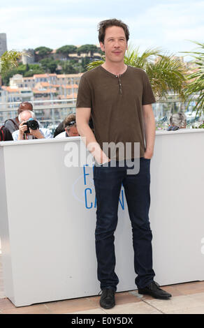 Cannes, France. 20th May, 2014. French actor Reda Kateb poses during the photocall for 'Lost River' at the 67th annual Cannes Film Festival, in Cannes, France, 20 May 2014. The movie is presented in the section Un Certain Regard of the festival which runs from 14 to 25 May. Photo: Hubert Boesl/dpa NO WIRE SERVICE/dpa/Alamy Live News Stock Photo