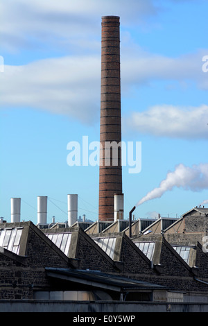 Chimney at the Michelin factory, Clermont-Ferrand, France Stock Photo