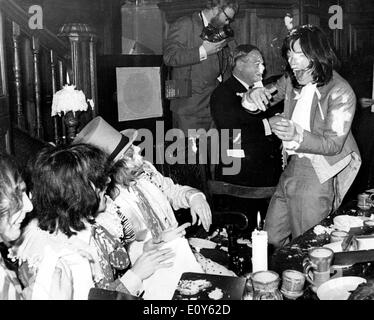 Mick Jagger and The Stones have cake fight Stock Photo