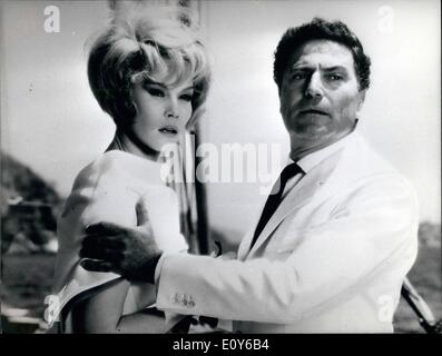 Dec. 12, 1968 - Operation Paradise Is the title od the films that is filming at Delaurentiis Studio in Rome. The exterior of the film were turned in Brasil and in the Brasilian Jungle, the film recount the story o scientist, the invention of him menaces, the humanity. Spies and beautiful women hurt turn around the mysterious scientist. Phot Shows American actress Dorothy Province and Raf Vallone (the scientist of the film...) in a scene of the ''Operation Paradise' Stock Photo