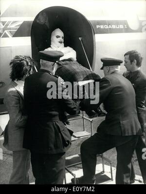 Apr. 04, 1969 - Barry Ryan arrives back home after being badly burned in a studio accident in Munich: Pop singer Barry Ryan, who was seriously burned in a studio accident in Munich recently, was flown back to Britain today with his face, arms and hands swathed in bandages. Travelling with him was his mother, singer Marion Ryan, who went to Munich to visit him in Hospital. They were met at London Airport by Barry's twin brother Paul, at one time part of the brothers singing act, but who now writes songs Stock Photo