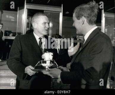 Feb. 02, 1969 - Col. Frank Borman visits Ministry of technology.: Col. Frank Borman, commander of the American Apollo 8 spacecraft which orbited the moon, who is in London on a goodwill visit, today visited the Ministry of Technology. Photo shows Col. Frank Borman (left) presents a model of Apollo 8 spacecraft to Mr. Anthony Wedgwood Benn, the Minister of Technology, outside the Ministry today. Stock Photo