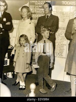 May 05, 1969 - Prince Micheal takes part in the Daily Mail air race: PRINCE MICHEAL of KENT who is a Captain in the 11th Husars, clocked in at the Post Office Tower this morning after completing in the Daily Mail Transatlantic Air Race. He flew in from New York in a VC 10. Their to meet him on his arrival was the Duke of Kent with his wife and children. Photo shows THE DUKE OF Kent with his wife and two children Earl of St. Andrew and Lady Helen Windsor seen in the Post Office Tower awaiting the arrival of Prince Micheal who was taking part in the Air Race today. Stock Photo