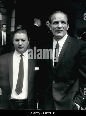 Sep. 09, 1969 - BRITISH BOXING PAYS TRIBUTE TO ROCKY MARCIANO AT A MEMORIAL SERVICE IN CLERKENWELL Several British Boxers Paid tribute to ROCKY MARCIANO when they attended Memorial Sevice for the Late American Heavyweight Champion of the World, at St Peter's italian Church. Clearkenwell Road, E.C. today PHOTO SHOWS:- HENRY COOPER who fights JIMMY ELLIS, the American heavyweight at Wembley on Sept. 27th, is pictured with DON COCKELL who fought the late ROCKY MARCIANO for the world title in 1955. Seen arriving for the Memorial Service today. Stock Photo