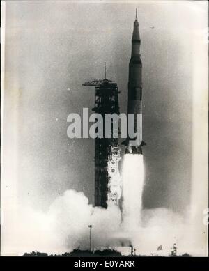 Jul. 07, 1969 - Apollo 11 Off To The Moon: Withe smoke and flames the Apollo 11 Autumn V Rocket as it lifts off it's pad at Kennedy Space Centre Florida. At the top of mighty rocket ride the three Astronauts Armstrong and Collins enroute to be man's first landing on the Surface of the Moon. Stock Photo