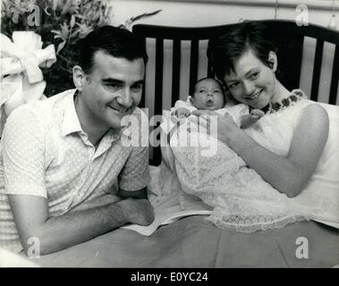 Aug. 08, 1969 - Italian singer Rita Pavone pictured at the Nursing Home, 27, Welbeck Street, London, today, with her baby son, who was born on August 6th, and her husband, Teddy Reno. The baby with be Christened Alexander Neil Caesar. Stock Photo