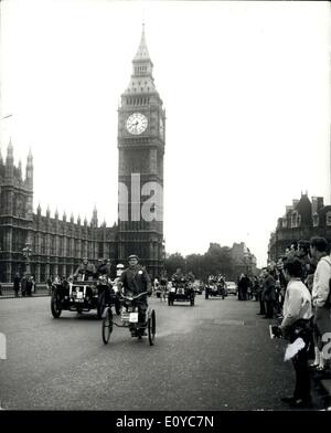 Nov. 02, 1969 - The Annual Veteran Car Club's London to Brighton Run.: The annual R.A.C.'s Veteran Car Run to Brighton took place today. The competitors moved off from Hyde Park for the 50-mile journey to Brighton. Photo shows The shadow of Big Ben some of the Veteran cars are seen passing over Westminster Bridge soon after the start from Hyde Park early this morning. Stock Photo