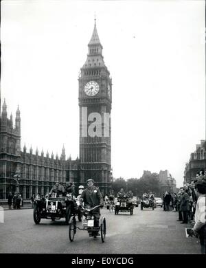 Nov. 11, 1969 - The Annual Veteran Car Club's London To Brighton Run: The annual R.A.C.'s Veteran Car Run to Brighton took place today. The competitors moved off from Hyde Park for the 50-mile journey to Brighton. Photo shows In th shadow of Big Ben some of the Veteran cars are seen passing over Westminster Bridge soon after the start from Hyde Park early this morning. Stock Photo