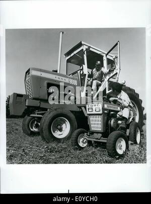 Nov. 11, 1969 - New Tractors Span Power Range -- Modern farmers--like new car buyers--want added power and comfort options for agricultural tractors. Ford Motor Company's new 145 PTO horsepower model 9000 tractor (left) can be equipped with all weather cab, air conditioning and a heater for year-around driver comfort. Little brother to the 9000 is Ford's 14 horsepower model 140 lawn and garden tractor. Ford's new line up of tractors and equipment now features 27 basic tractor models--all outgrowths of the world's first mass produced tractor, the Fordson. Stock Photo