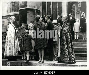 Dec. 12, 1969 - The Queen's Christmas . The queen holds the hand of her youngest child, five year old Prince Edward, as she leaves St.George's Chapel , Windsor, after attending Christmas morning service with other members of the Royal family. With her is Prince Philip and behind them are partly seen Prince Charles and Princess Anne .Behind the Queen is Queen Elizabeth the queen mother and at left are princess Margaret and her two children, Viscount Linley and Lady Sarah Armstrong Jones Stock Photo