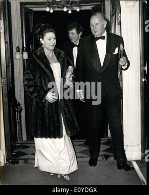 Dec. 12, 1969 - Princess Margaret attends Gala performance at the Aldwych Theatre: This evening Princess Margaret and Lord Snowdon attended a gala performance of The Revenger's Tragedy, at the Aldwych Theatre in aid of the Shakespeare Theatre Trust Appeal. Photo shows Princess Margaret seen arriving at the Aldwych Theatre with her is Sir George Farmer, Chairman of the Board of Governors of the Royal Shakespeare Theatre, who meet her on her arrival. Stock Photo