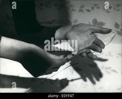 Jan. 1, 1970 - The great problem of the narcotics is actually to the attention of the authorities. The modern youth unconsciously go toward to the moral destruction of the soul and body. Photo shows the dramatic sequence of the preparation and the use of the narcotic of a group of three youngs, two girls and one boy. Stock Photo