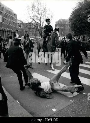 May 05, 1970 - Demonstrators Clash With Police During Protest March On The American Embassy In London: Thousands of demonstrators chanting anti-war slogans and protesting against the American action in Cambodia clashed with police when they marched to the American Embassy in Grosvenor Square yesterday. Fighting broke out when they tried to break through the police line guarding the embassy. Photo shows One of the demonstrators who broke through the police Gordon being dragged away during yesterday's demonstration in Grosvenor Square. Stock Photo