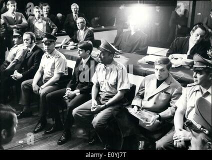 Jul. 07, 1970 - Lebach trial opened up in Saarbruecken: On June 29th the jury court in Saarbruecken/West Germany opened up trial against Hans-Juergen Fuchs (27) Wolfgang Dits (27), and Gernot Wenzel (25). The three young men are on trial for having killed on Janaury 29th, 1969, four soldiers of the German army and seriously wounds another one, when they committed an armed attack on an Army ammunition depot near Lebach/West Germany. Photo shows the indicted Hans - Juergen Fuchs (left), Gernot Wenzel (center), Wolfgang Ditz (right) in the dock. Stock Photo