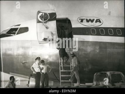 Nov. 11, 1970 - Some of the passengers boarding the hijacked Twa plane which landed in the Jordanian desert. The popular front flag is seen in front of the plane.The passengers of the three planes were moved to Amman. Stock Photo