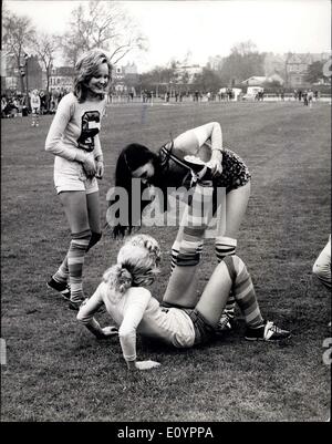 Mar. 01, 1971 - The World's Most Beautiful Football Match.: The world's most beautiful football match presented by Jon, Marc & Paul, hairdressers - took place yesterday at Hurlingham Stadium between the Lumley Lovers and The Robinson Ravers - two teams of beautiful girls from rival model agencies Peter Lumley and Gavin Robinson.The match was in aid of charity. Photo shows A member of The Robinson Ravers team, sportingly gives assistant to an injured Lumley Lovers player - during yesterday's match at Hurlingham Stadium. Stock Photo