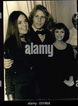 Mar. 20, 1971 - The stars of the movie, ''Love Story,'' Ryan O'Neal and Ali MacGraw are seen here with Mireille Mathieu at the movie's premiere Champs-Elysee Theater.