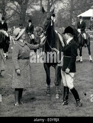 Apr. 04, 1971 - Princess Anne Placed fifth at Badminton Horse Trials.: Princess Anne watched by the Queen and other members of the Royal Family, took fifth prize of &pound;150 ended yesterday. Photo shows The Queen had a congratulatory pat for Doublet, the chestnut gelding which she gave to Princess Anne, who came fifth in the Badminton three-day event which ended yesterday. Stock Photo