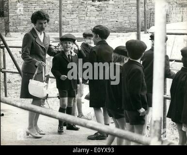 Sep. 09, 1971 - Prince Edward Starts School: Prince Edward, age 7, the Queen's youngest son, started school yesterday with Princess Alexander's 7-year-old son, James Ogilvy. The boys, who have been Private having private lessons at Buckingham Palace, joined 90 others boys at Gibbs Preparatory School, West Kensington, London. Photo Shows Teacher Miss Rosemary Harris puts her and on the shoulder of Prince Edward as she escorted the boys on a fact-finding tour of the district in the vicinity of the school. Stock Photo