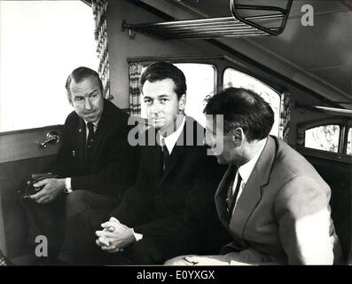 Sep. 27, 1971 - Astronaut and cosmonaut together in a cabin. For the first time in the space history probably, an astronaut from USA and a cosmonaut from USSR climbed together in the same cabin... but it only was a cabin of the Pilatus suspension railway. James Lovell (left), Apollo 13 commander, and Vitali Sevastianov (center), Sojus 9 Pilot, on a common visit to Switzerland, made an excursion to the Pilatus summit in company of Mr.Waldis, director of Swiss Trafffic Museum. Stock Photo