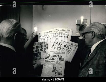 Feb. 02, 1972 - Miners Pay Talks Break Down. Situation ''Very Serious Indeed'': Talks aimed at ending the five week pay strike by miners broke down yesterday, and the employment Secretary, Mr. Carr said that the situation is ''very serious indeed''. Photo Shows Candles being used to read the newspaper headlines - in London today. Stock Photo