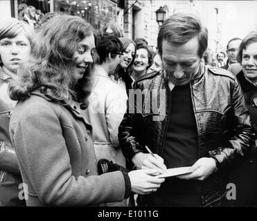 Sept. 26, 2012 - Andy Williams, whose performance of 'Moon River' became a pop music classic, and an Emmy-winning TV variety show host, has died at the age of 84 of bladder cancer in Branson, Missouri. PICTURED: Nov. 8, 1970 - London, England, United Kingdom. - Singer ANDY WILLIAMS signs autographs for adoring fans upon arriving at the London Palladium to rehearse for the Royal Variety Performance. Stock Photo