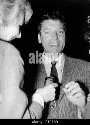 Actor Burt Lancaster being interviewed Stock Photo